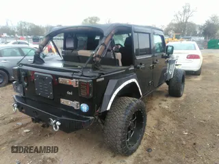 2007 Jeep Wrangler Unlimited X with VIN 1J4GA39177L147346, listed as a IAAI auction lot 41825501 with 163,027 mi miles and . Bid and sale history available at DreamBid. Image 4.