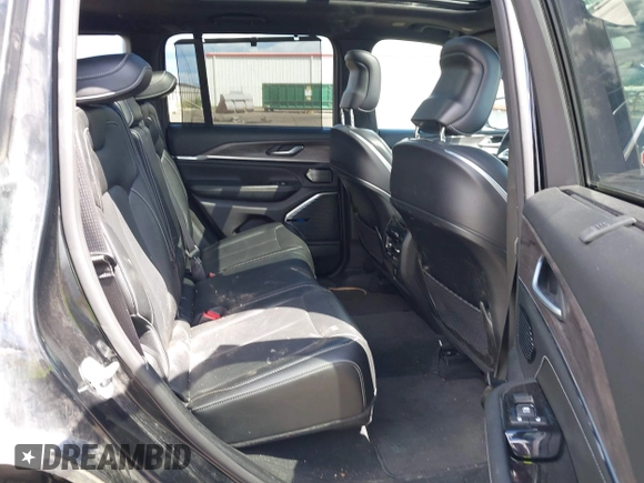 2023 Jeep Grand Cherokee Overland with VIN 1C4RJHDG2PC526889, listed as a IAAI auction lot 42247177 with 71,390 mi miles and . Bid and sale history available at DreamBid. Image 8.