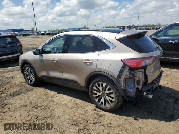2020 Ford Escape Titanium with VIN 1FMCU9J90LUA49890, listed as a Copart auction lot 57228065 with 24,283 mi miles and Salvage title. Bid and sale history available at DreamBid. Image 2.