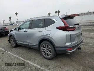 2020 Honda CR-V Touring z VIN 7FARW1H96LE006653, wystawiony jako Copart lot #57167475 z przebiegiem 49 286 mil mil oraz Szkoda całkowita • Salvage title. Historia ofert i sprzedaży dostępna na DreamBid. Obrazek 2.