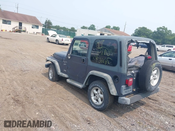 2001 Jeep Wrangler Sport with VIN 1J4FA49S91P330175, listed as a IAAI auction lot 40133432 with 999,999 mi miles. Bid and sale history available at carsss.com. Image 3.