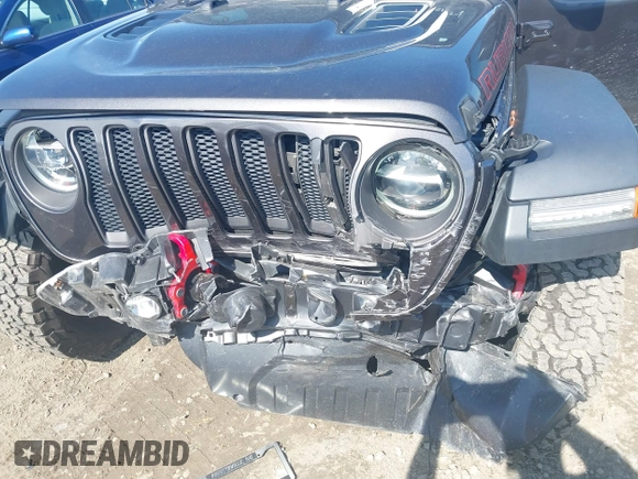 2021 Jeep Wrangler Unlimited Rubicon with VIN 1C4HJXFN5MW509483, listed as a IAAI auction lot 42245703 with 59,461 mi miles and . Bid and sale history available at DreamBid. Image 6.