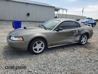 2001 Ford Mustang GT Deluxe с VIN 1FAFP42X41F120573, выставлен на аукционе Copart как лот 58410755 с пробегом 136 094 миль миль и Списание • Salvage title. История ставок и продаж доступна на DreamBid. Изображение 1.