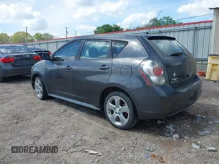 2009 Pontiac Vibe 1SB with VIN 5Y2SP67089Z454034, listed as a IAAI auction lot 41872691 with 233,392 mi miles and . Bid and sale history available at carsss.com. Image 3.
