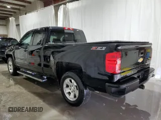 2017 Chevrolet Silverado 1500 LT with VIN 1GCVKREC0HZ141018, listed as a Copart auction lot 52708255 with 96,790 mi miles and Salvage Title. Bid and sale history available at DreamBid. Image 2.