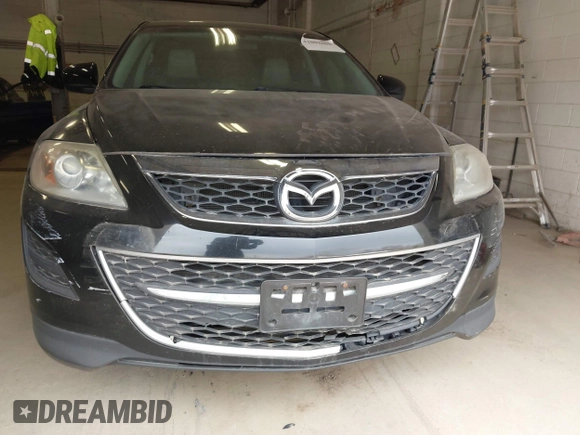 2011 Mazda CX-9 Touring with VIN JM3TB2CV1B0300621, listed as a IAAI auction lot 42002068 with 185,162 mi miles and . Bid and sale history available at carsss.com. Image 6.