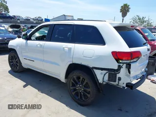 2018 Jeep Grand Cherokee Altitude with VIN 1C4RJEAG2JC404009, listed as a IAAI auction lot 42691304 with 60,948 mi miles and . Bid and sale history available at DreamBid. Image 3.
