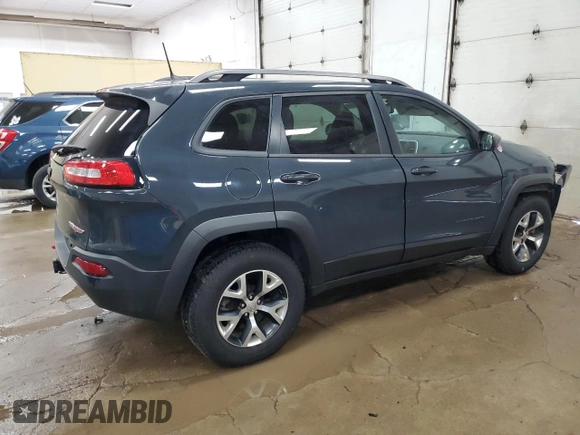 2016 Jeep Cherokee Trailhawk z VIN 1C4PJMBS5GW179273, wystawiony jako Copart lot #61175695 z przebiegiem 110 295 mil mil oraz Czysty tytuł • Clean title. Historia ofert i sprzedaży dostępna na DreamBid. Obrazek 3.