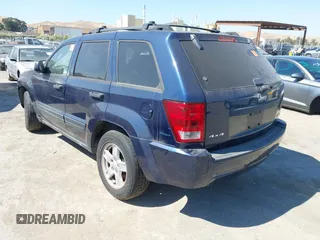 2005 Jeep Grand Cherokee Laredo with VIN 1J4GR48K35C518587, listed as a IAAI auction lot 42741449 with 164,821 mi miles and . Bid and sale history available at DreamBid. Image 3.