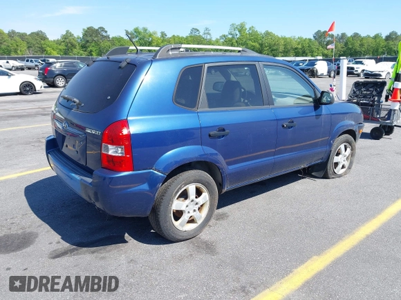 2005 Hyundai Tucson GL with VIN KM8JM12B85U233228, listed as a IAAI auction lot 42051627 with 170,742 mi miles. Bid and sale history available at carsss.com. Image 4.