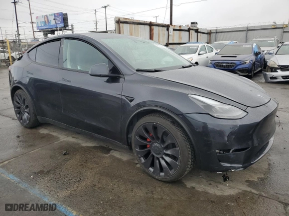 2024 Tesla Model Y Performance with VIN 7SAYGDEF7RF104408, listed as a Copart auction lot 86756394 with NaN miles and Salvage Title. Bid and sale history available at carsss.com. Image 4.