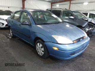 2000 Ford Focus LX with VIN 1FAFP33P9YW265353, listed as a IAAI auction lot 42277806 with 176,373 mi miles and . Bid and sale history available at DreamBid. Image 1.