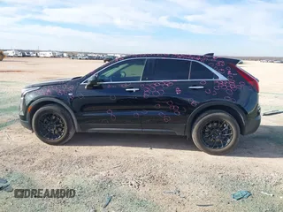 2020 Cadillac XT4 FWD Luxury z VIN 1GYAZAR48LF151119, wystawiony jako IAAI lot #41327430 z przebiegiem 62 704 mil mil oraz . Historia ofert i sprzedaży dostępna na DreamBid. Obrazek 14.