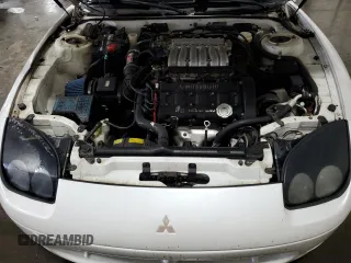 1996 Mitsubishi 3000GT GT z VIN JA3AM84J5TY002387, wystawiony jako Copart lot #64983534 z przebiegiem 149 380 mil mil oraz Szkody całkowita. Historia ofert i sprzedaży dostępna na DreamBid. Obrazek 11.