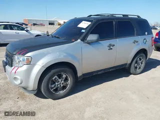 2010 Ford Escape XLT with VIN 1FMCU0DG3AKA09821, listed as a IAAI auction lot 41785754 with 208,875 mi miles. Bid and sale history available at carsss.com. Image 2.
