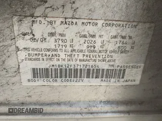 2007 Mazda Mazda3 i Sport with VIN JM1BK12F371721654, listed as a IAAI auction lot 42019268 with 120,518 mi miles. Bid and sale history available at carsss.com. Image 9.