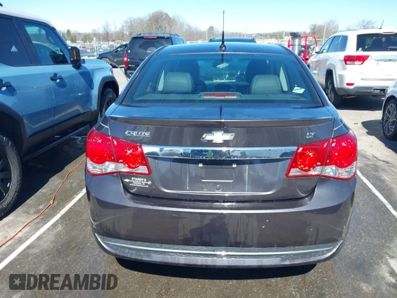 2014 Chevrolet Cruze 2LT z VIN 1G1PE5SB7E7200554, wystawiony jako IAAI lot #41739058 z przebiegiem 103 259 mil mil oraz . Historia ofert i sprzedaży dostępna na DreamBid. Obrazek 16.