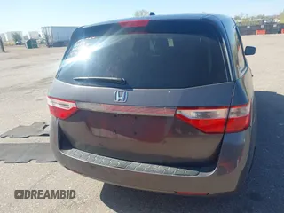 2012 Honda Odyssey EX-L with VIN 5FNRL5H61CB095789, listed as a IAAI auction lot 42065507 with 138,570 mi miles and . Bid and sale history available at DreamBid. Image 16.
