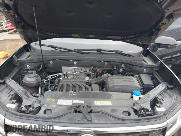2023 Volkswagen Atlas SE z VIN 1V2KE2CA8PC225834, wystawiony jako IAAI lot #41330975 z przebiegiem 13 629 mil mil oraz . Historia ofert i sprzedaży dostępna na DreamBid. Obrazek 10.