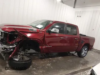 2020 Ram 1500 Laramie z VIN 1C6SRFJT5LN109384, wystawiony jako IAAI lot #42290125 z przebiegiem 73 629 mil mil oraz . Historia ofert i sprzedaży dostępna na DreamBid. Obrazek 15.