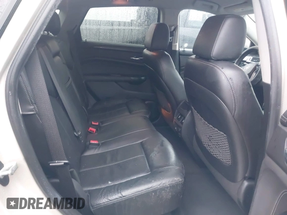 2015 Cadillac SRX with VIN 3GYFNAE37FS536363, listed as a IAAI auction lot 41551790 with 48,422 mi miles and . Bid and sale history available at DreamBid. Image 8.