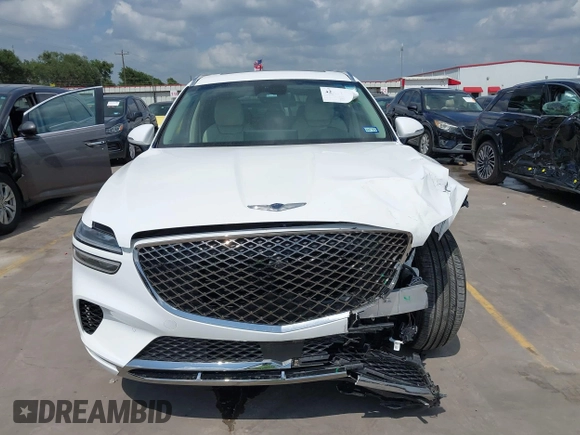 2023 Genesis GV70 2.5T with VIN KMUMADTB7PU139111, listed as a IAAI auction lot 42391876 with 13,157 mi miles and . Bid and sale history available at DreamBid. Image 12.