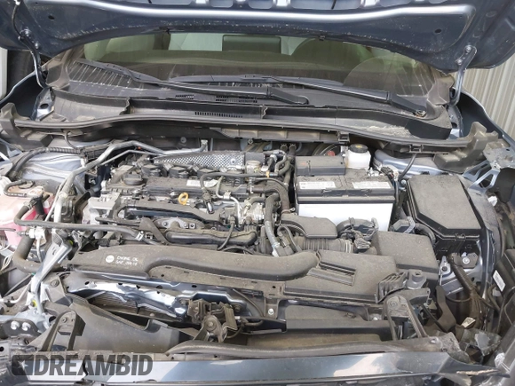 2022 Toyota Corolla Cross L with VIN 7MUAAAAG9NV034659, listed as a IAAI auction lot 42125356 with 14,631 mi miles and . Bid and sale history available at DreamBid. Image 10.