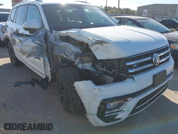2018 Volkswagen Atlas SEL with VIN 1V2RR2CA1JC566065, listed as a IAAI auction lot 41687434 with 77,795 mi miles and . Bid and sale history available at DreamBid. Image 6.
