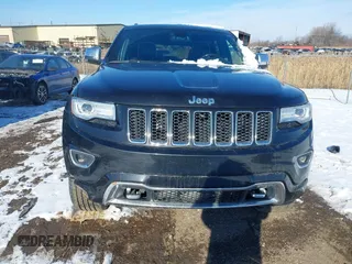 2015 Jeep Grand Cherokee Overland z VIN 1C4RJFCG3FC726748, wystawiony jako IAAI lot #41369715 z przebiegiem 120 905 mil mil oraz . Historia ofert i sprzedaży dostępna na DreamBid. Obrazek 12.