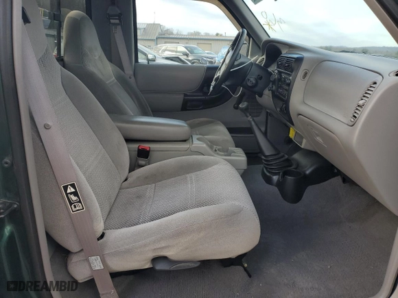 2000 Ford Ranger XLT with VIN 1FTYR11X0YTA32855, listed as a Copart auction lot 84517284 with 100,235 mi miles and Salvage Title. Bid and sale history available at carsss.com. Image 7.