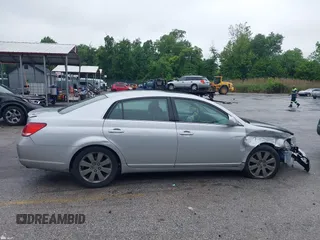 2007 Toyota Avalon XL z VIN 4T1BK36BX7U177246, wystawiony jako IAAI lot #42264311 z przebiegiem 183 324 mil mil oraz . Historia ofert i sprzedaży dostępna na DreamBid. Obrazek 14.