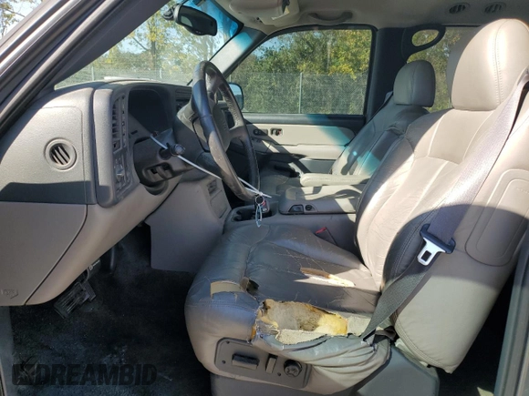 2002 Chevrolet Tahoe LT with VIN 1GNEK13Z32R130263, listed as a Copart auction lot 75677274 with 215,534 mi miles and Clean Title. Bid and sale history available at carsss.com. Image 7.