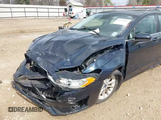 2020 Ford Fusion SE with VIN 3FA6P0HD5LR184732, listed as a IAAI auction lot 41555047 with 98,512 mi miles and . Bid and sale history available at DreamBid. Image 6.