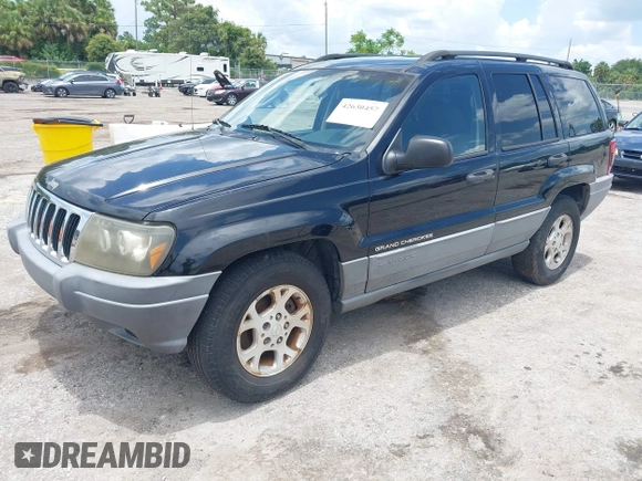 2002 Jeep Grand Cherokee Laredo with VIN 1J4GX48S22C226527, listed as a IAAI auction lot 42630457 with 197,333 mi miles and . Bid and sale history available at DreamBid. Image 2.