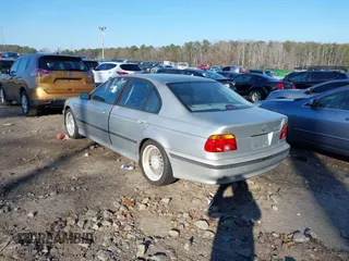 2000 BMW 5 Series 528iA with VIN WBADM6340YGU19599, listed as a IAAI auction lot 41139764 with 233,657 mi miles. Bid and sale history available at carsss.com. Image 3.