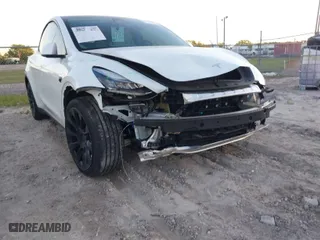 2022 Tesla Model Y Long Range with VIN 7SAYGDEE6NF313110, listed as a IAAI auction lot 41703939 with 12,468 mi miles. Bid and sale history available at carsss.com. Image 6.