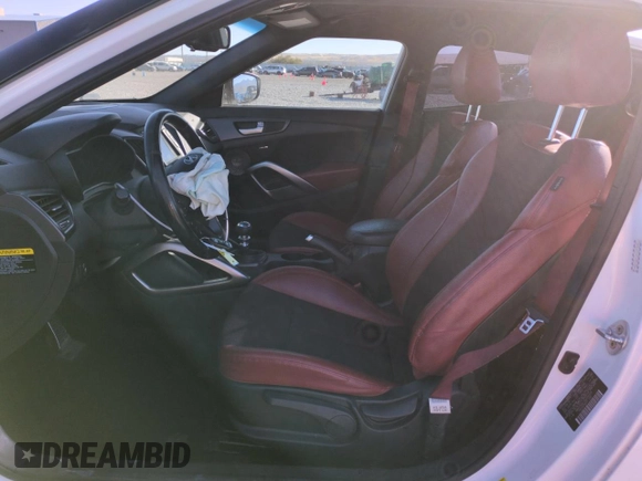 2016 Hyundai Veloster Turbo with VIN KMHTC6AE7GU284808, listed as a Copart auction lot 79896544 with 154,609 mi miles and Salvage Title. Bid and sale history available at carsss.com. Image 7.