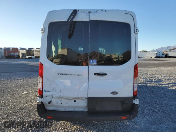 2018 Ford Transit Passenger XL z VIN 1FBZX2CM2JKA87942, wystawiony jako Copart lot #41504435 z przebiegiem 72 729 mil mil oraz Szkoda całkowita • Salvage title. Historia ofert i sprzedaży dostępna na DreamBid. Obrazek 6.