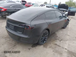 2019 Tesla Model 3 Mid Range with VIN 5YJ3E1EA8KF538083, listed as a IAAI auction lot 41891458 with 46,958 mi miles and . Bid and sale history available at carsss.com. Image 4.
