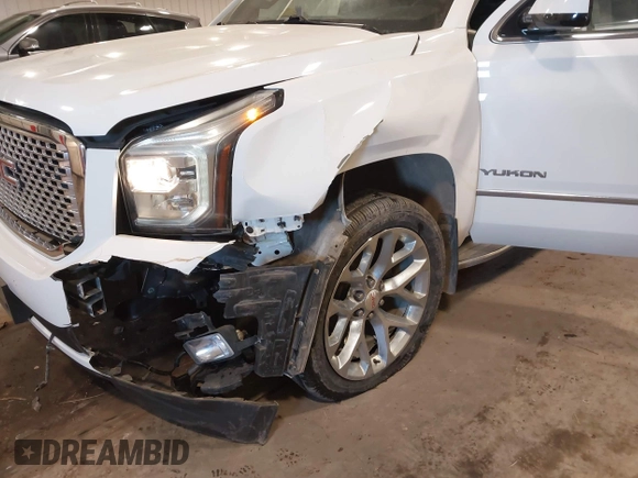 2015 GMC Yukon SLE with VIN 1GKS2AKC6FR103447, listed as a IAAI auction lot 41596220 with 104,209 mi miles. Bid and sale history available at carsss.com. Image 6.