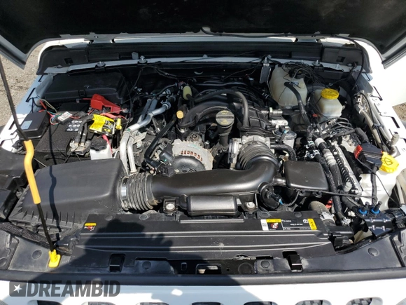 2023 Jeep Wrangler Sport with VIN 1C4HJXDGXPW596127, listed as a Copart auction lot 65395655 with 64,257 mi miles and Salvage title. Bid and sale history available at DreamBid. Image 12.