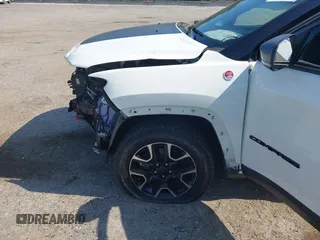 2021 Jeep Compass Trailhawk with VIN 3C4NJDDB7MT564467, listed as a IAAI auction lot 42330939 with 76,963 mi miles and . Bid and sale history available at DreamBid. Image 6.