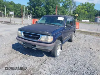 1997 Ford Explorer XL z VIN 1FMDU34E9VUC91672, wystawiony jako IAAI lot #42273914 z przebiegiem 153 944 mil mil oraz . Historia ofert i sprzedaży dostępna na DreamBid. Obrazek 2.