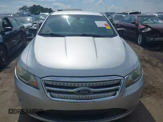 2011 Ford Taurus SE with VIN 1FAHP2DW9BG179423, listed as a IAAI auction lot 39683731 with 297,445 mi miles. Bid and sale history available at carsss.com. Image 12.