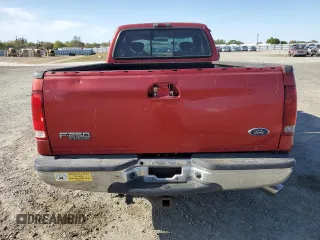 2002 Ford F-250 XL with VIN 1FTNX20F02EB64128, listed as a Copart auction lot 51979895 with 162,117 mi miles and Salvage title. Bid and sale history available at DreamBid. Image 6.