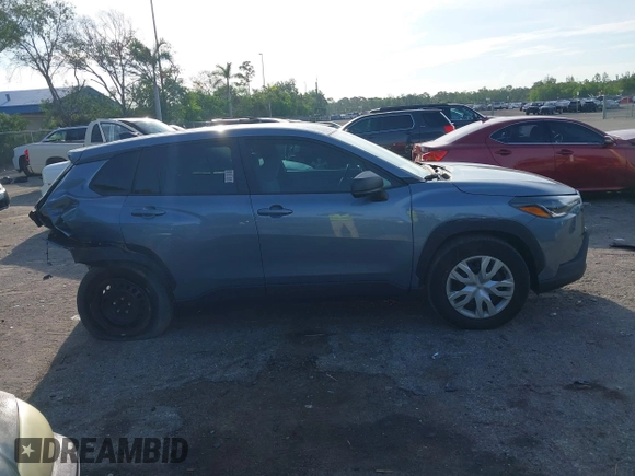2023 Toyota Corolla Cross L with VIN 7MUAAAAG4PV044969, listed as a IAAI auction lot 42388727 with 26,071 mi miles and . Bid and sale history available at DreamBid. Image 14.