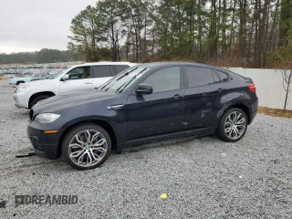2014 BMW X6 M with VIN 5YMGZ0C52E0C40258, listed as a Copart auction lot 43392765 with 92,300 mi miles and Clean Title. Bid and sale history available at carsss.com. Image 1.