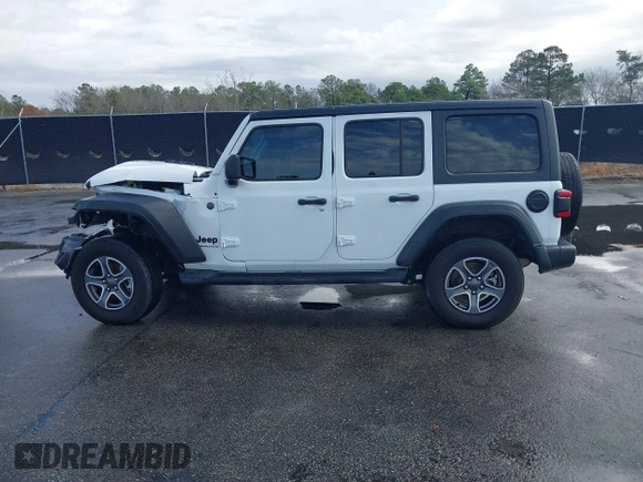 2023 Jeep Wrangler Sport S with VIN 1C4HJXDN9PW540842, listed as a IAAI auction lot 41712336 with 36,017 mi miles and . Bid and sale history available at DreamBid. Image 14.