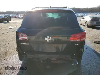 2016 Volkswagen Touareg Sport z VIN WVGEP9BP3GD004865, wystawiony jako Copart lot #87610915 z przebiegiem Nie podano mil oraz Szkoda całkowita • Salvage title. Historia ofert i sprzedaży dostępna na DreamBid. Obrazek 6.