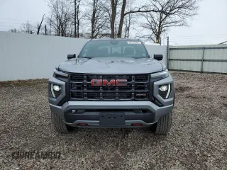 2023 GMC Canyon 4WD AT4 with VIN 1GTP6DEK5P1170230, listed as a Copart auction lot 52767295 with 26,769 mi miles and Salvage Title. Bid and sale history available at carsss.com. Image 5.